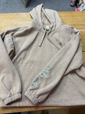 Ariat waiste length hoodie with draw string waiste
